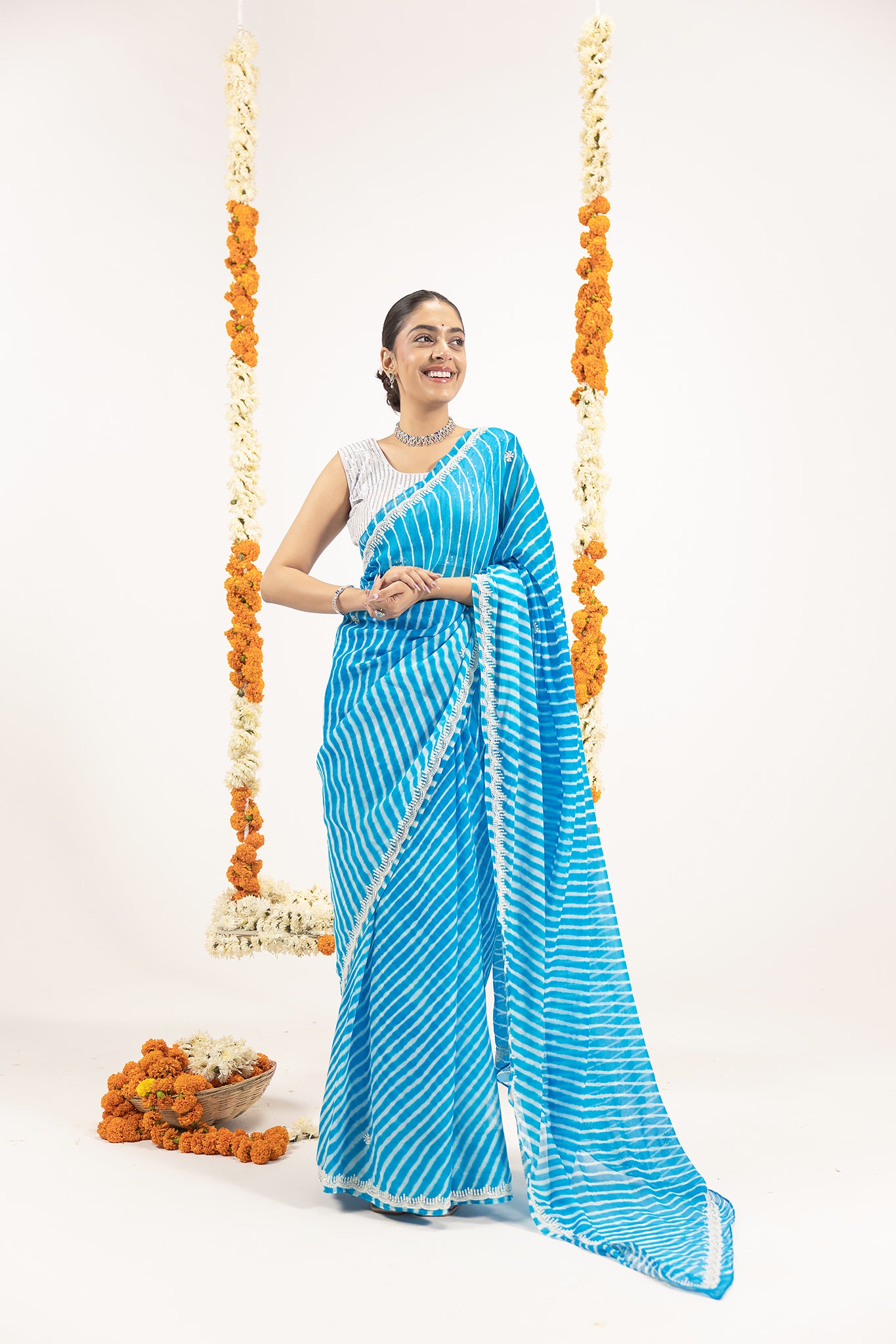 Pure Georgette 40 Gsm Firozi Blue Leheriya Resham Pearl Border Butti Work Saree