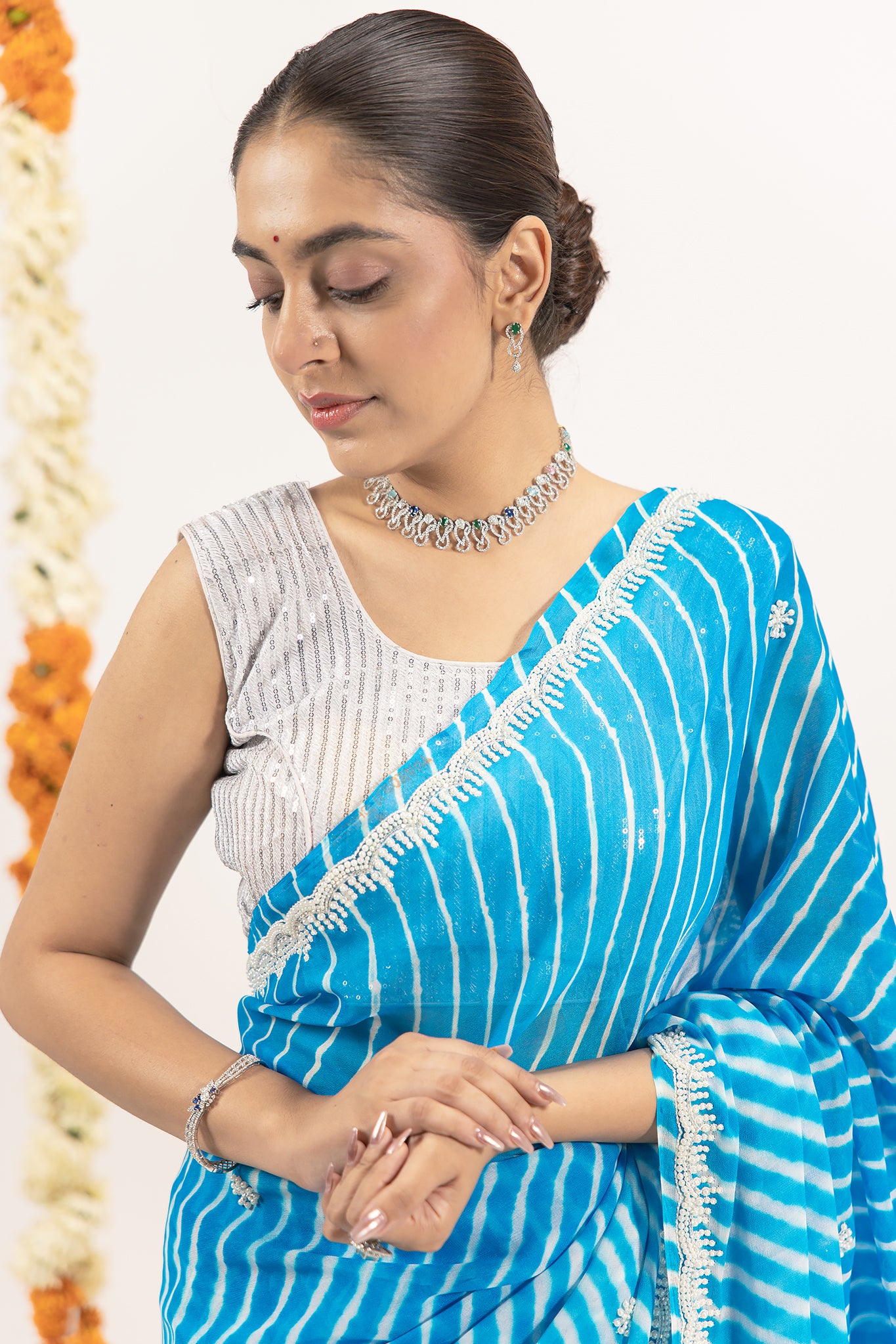 Pure Georgette 40 Gsm Firozi Blue Leheriya Resham Pearl Border Butti Work Saree