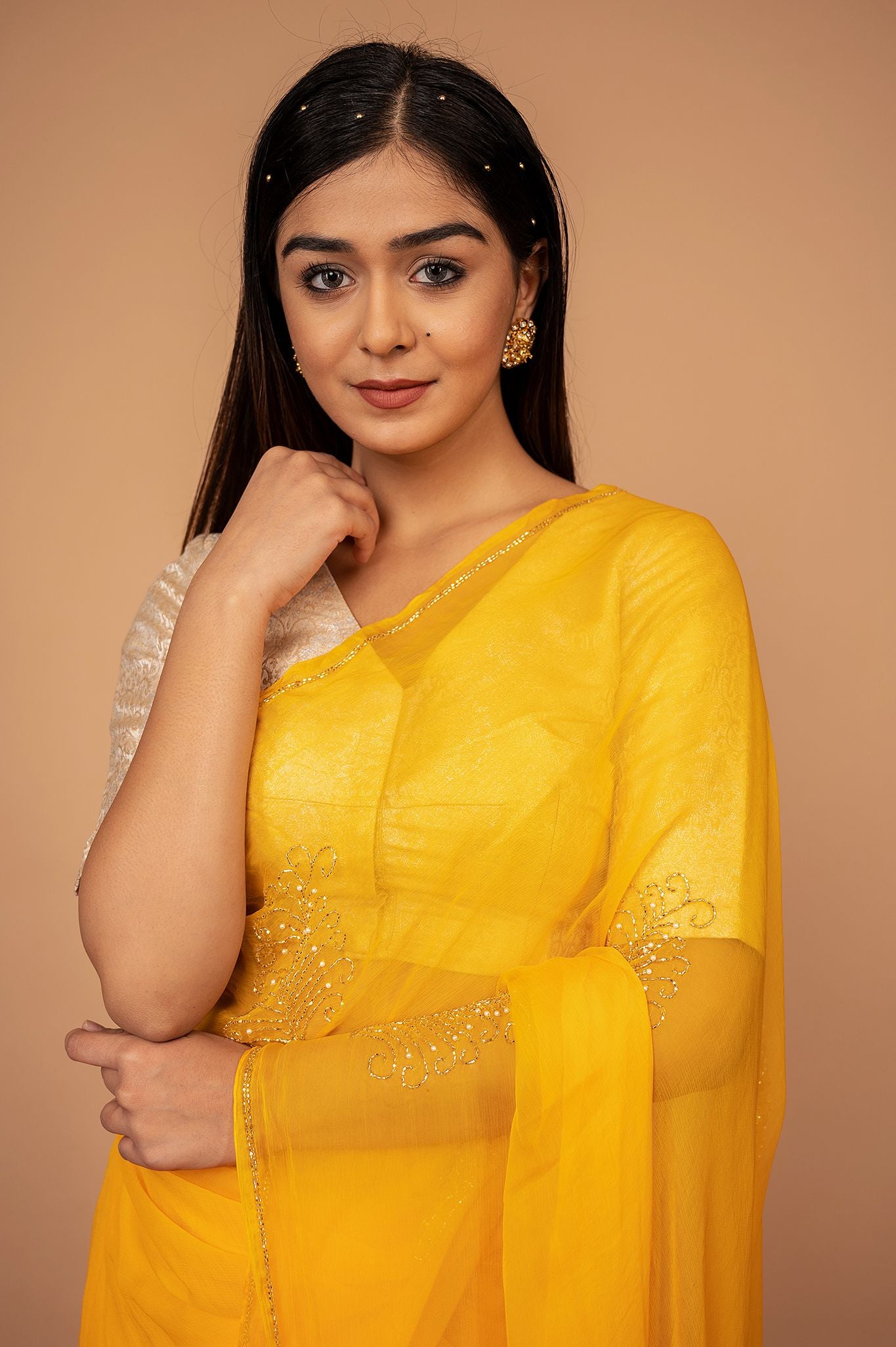 Yellow viscose chiffon kardana motif handwork casual wear saree