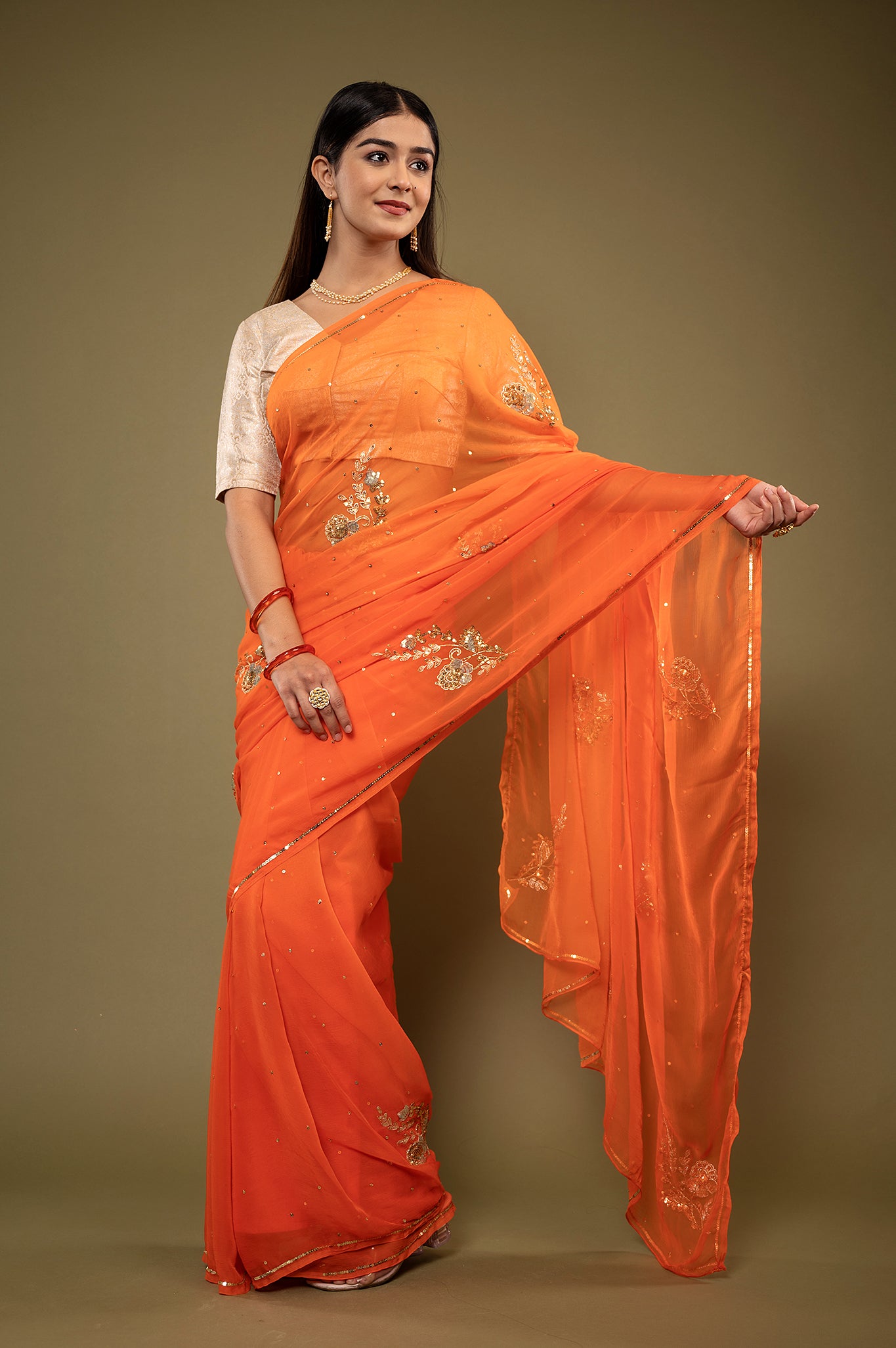 Orange light dark viscose chiffon aari sequins handwork casual wear saree