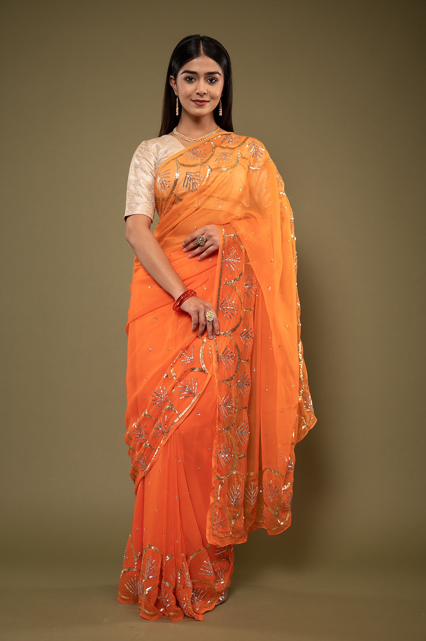 Orange viscose chiffon sequins border butti handwork casual wear saree