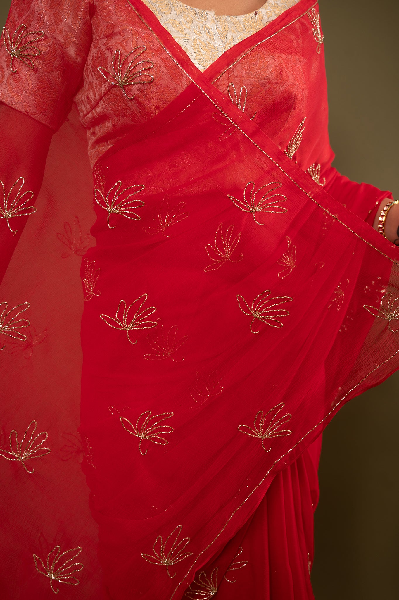 Red viscose chiffon kardana motif handwork casual wear saree