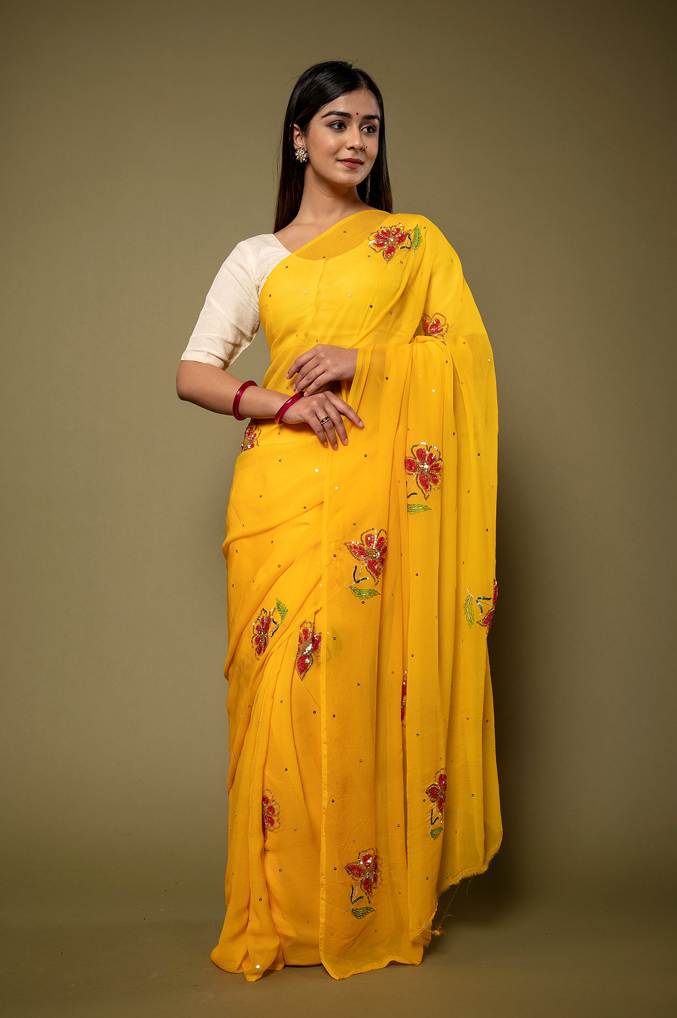 Yellow viscose chiffon sequins resham motif handwork party wear saree