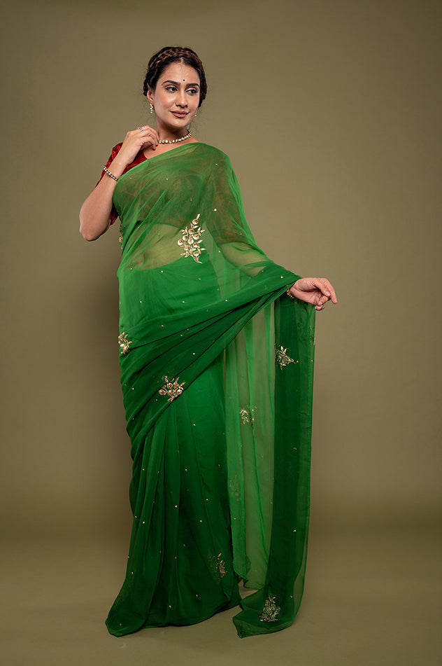 green light dark viscose chiffon aari sequins motif handwork saree