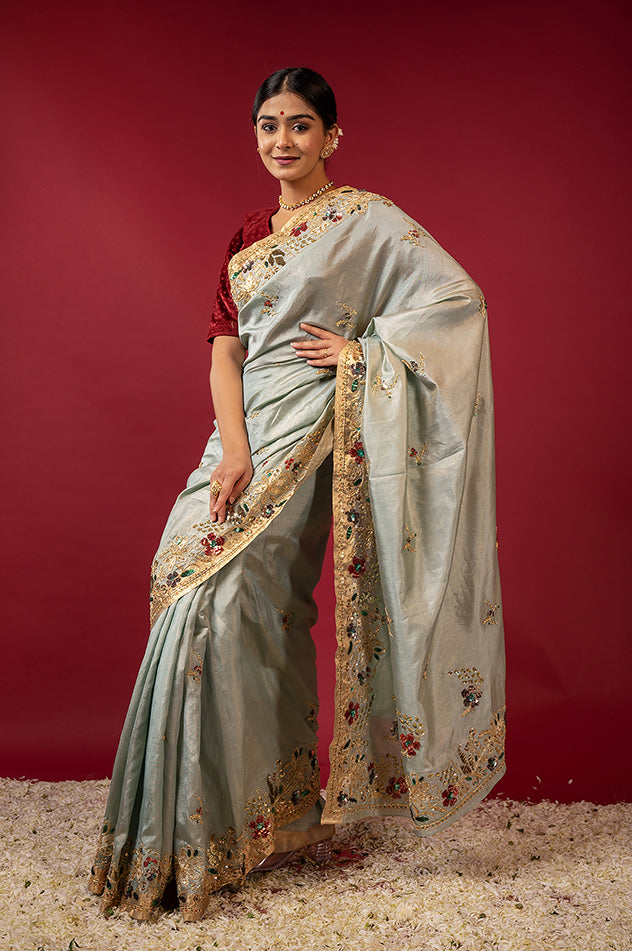Greyish green pure tissue zardozi sequins border butti handwork saree