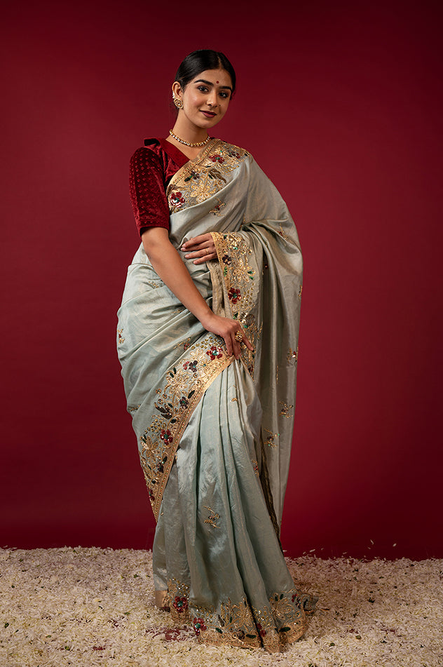 Greyish green pure tissue zardozi sequins border butti handwork saree