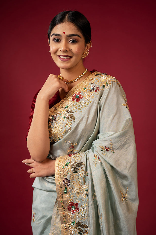 Greyish green pure tissue zardozi sequins border butti handwork saree