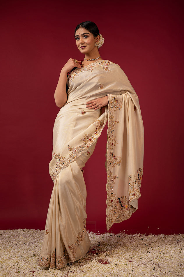 Cream pure tissue zardozi resham border butti handwork saree