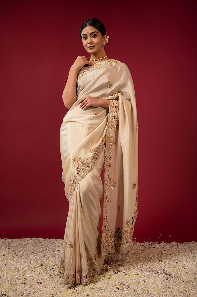 Cream pure tissue zardozi resham border butti handwork saree