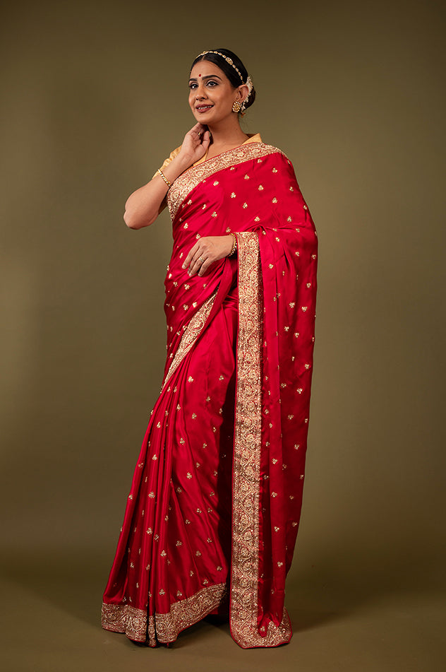 Red pure silk Satin zardozi border butti handwork saree