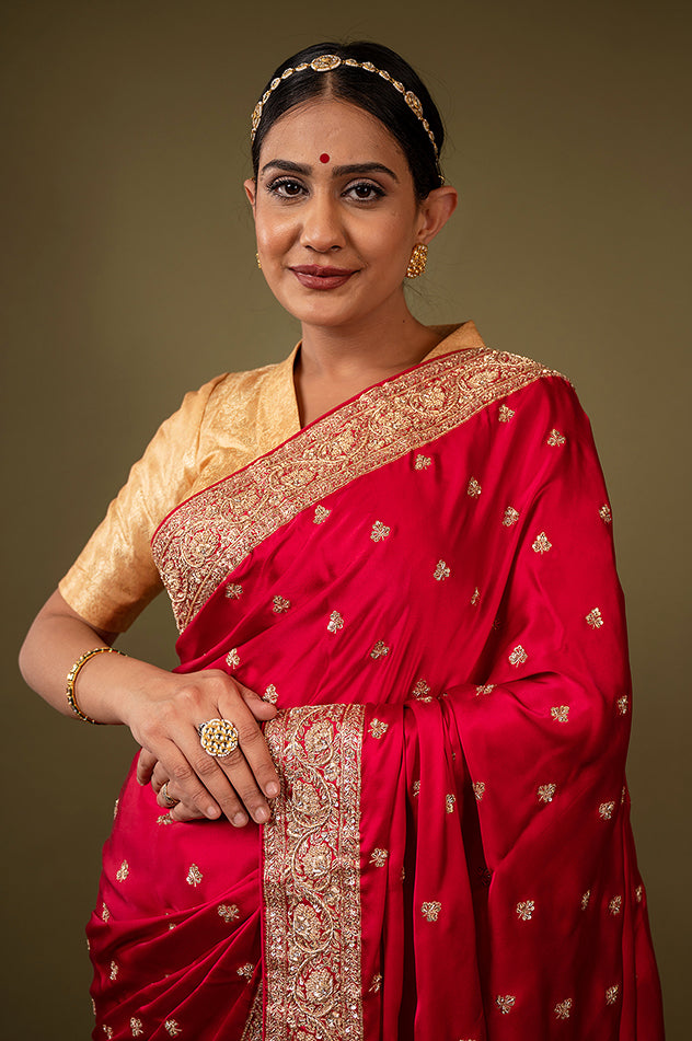 Red pure silk Satin zardozi border butti handwork saree