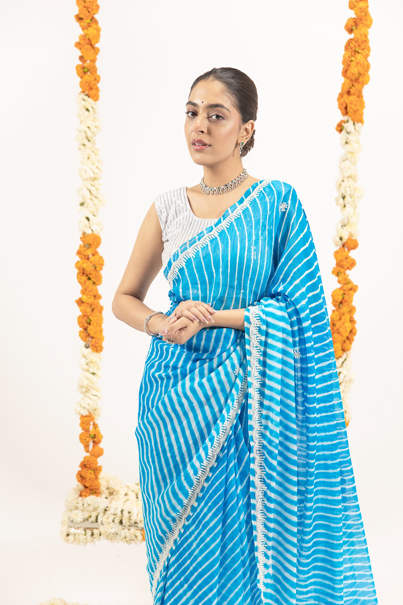 Pure Georgette 40 Gsm Firozi Blue Leheriya Resham Pearl Border Butti Work Saree