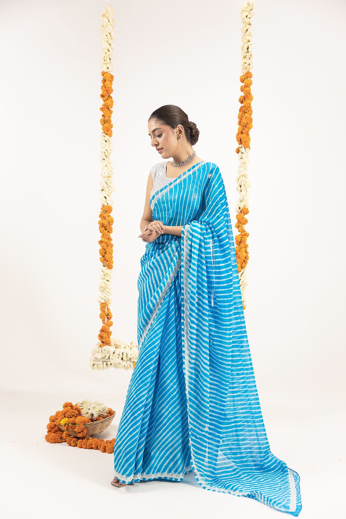 Pure Georgette 40 Gsm Firozi Blue Leheriya Resham Pearl Border Butti Work Saree