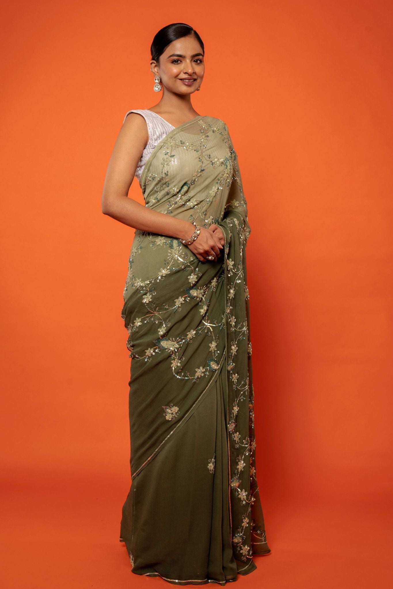 Olive green pure chiffon  aari sequins  jaal handwork saree