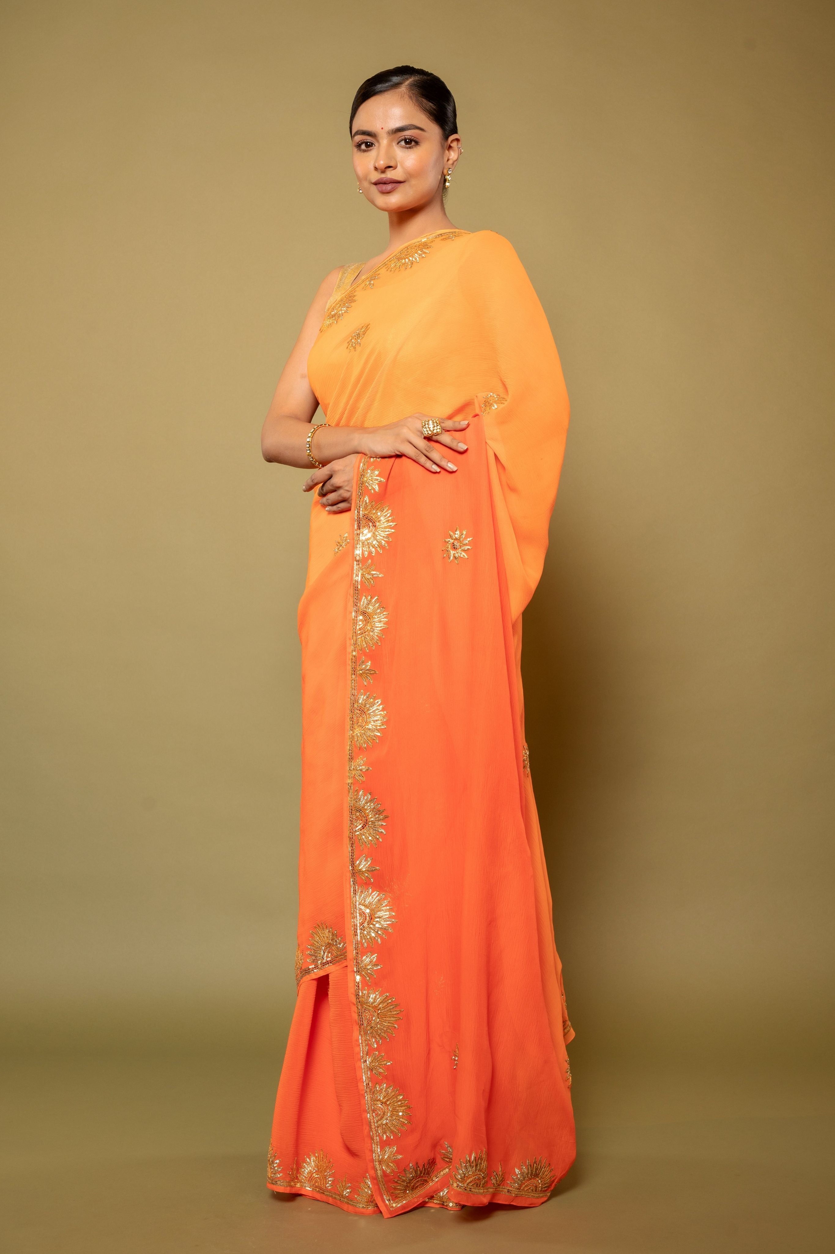 Orange light dark pure chiffon sikhiya gota border butti  handwork saree