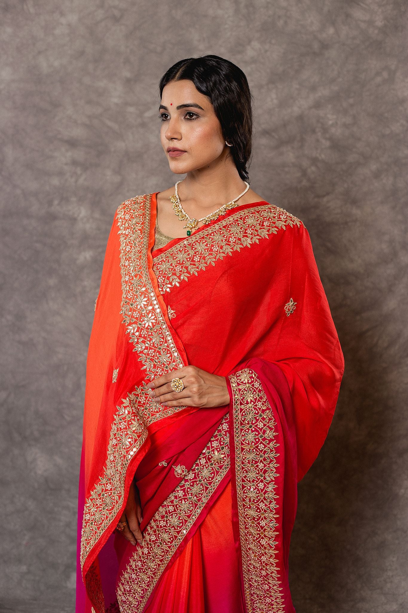 Rani orange pure chinnon chiffon gota pati border butti handwork saree