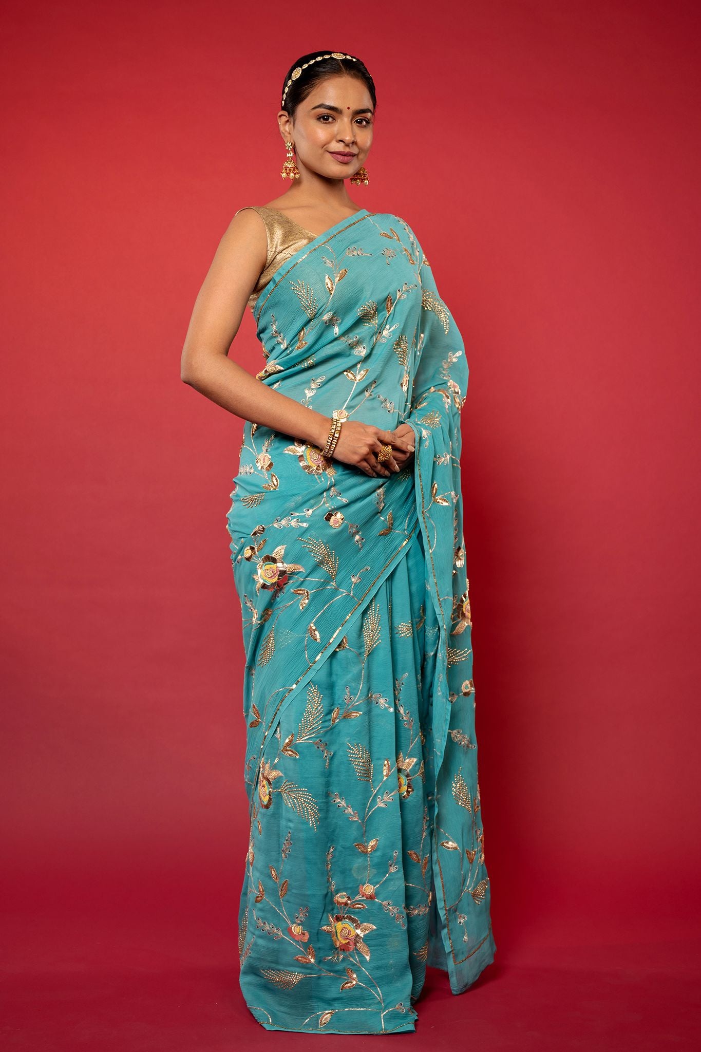Turquoise  pure chiffon aari sequins  jaal handwork saree