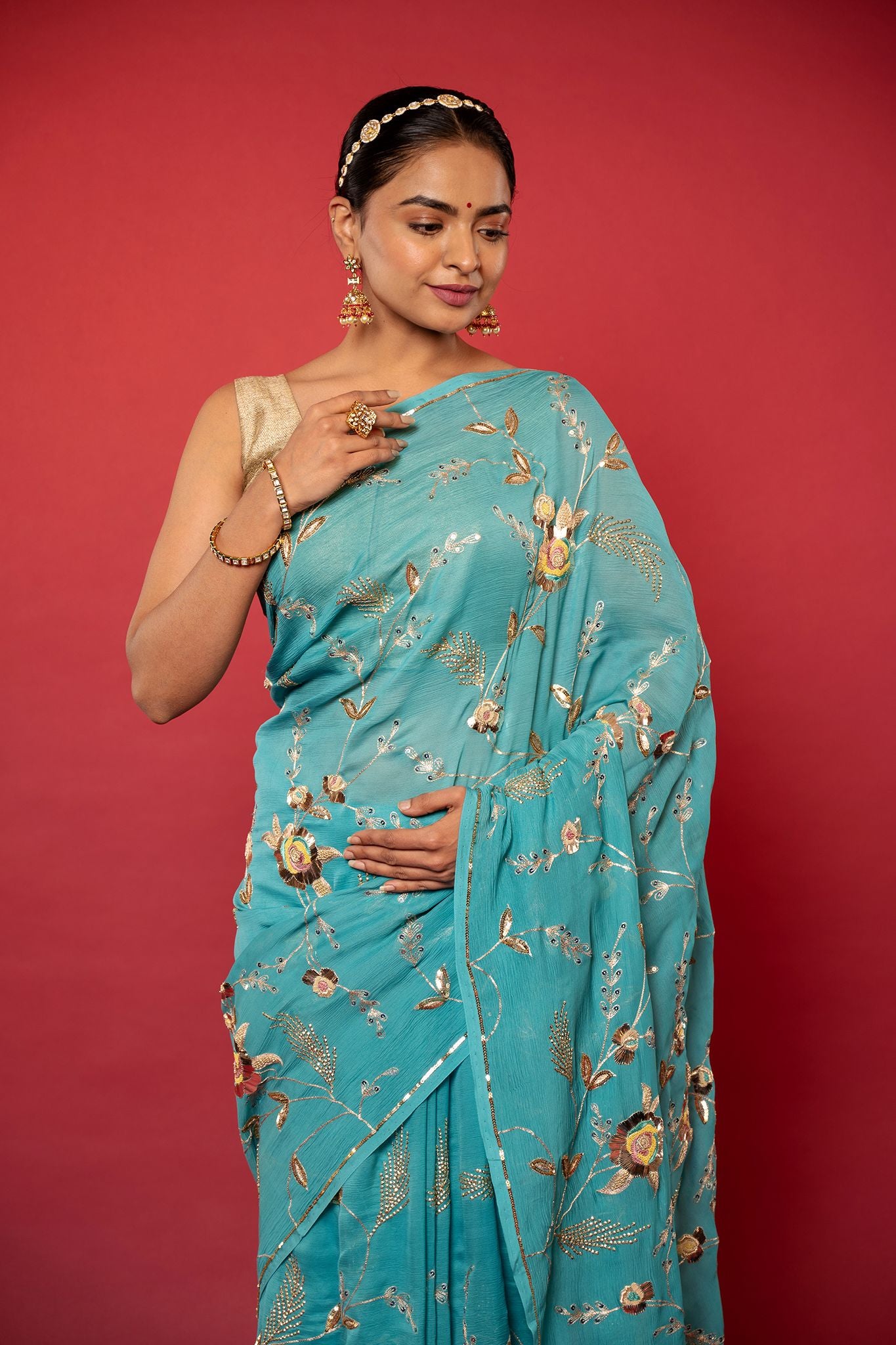 Turquoise  pure chiffon aari sequins  jaal handwork saree