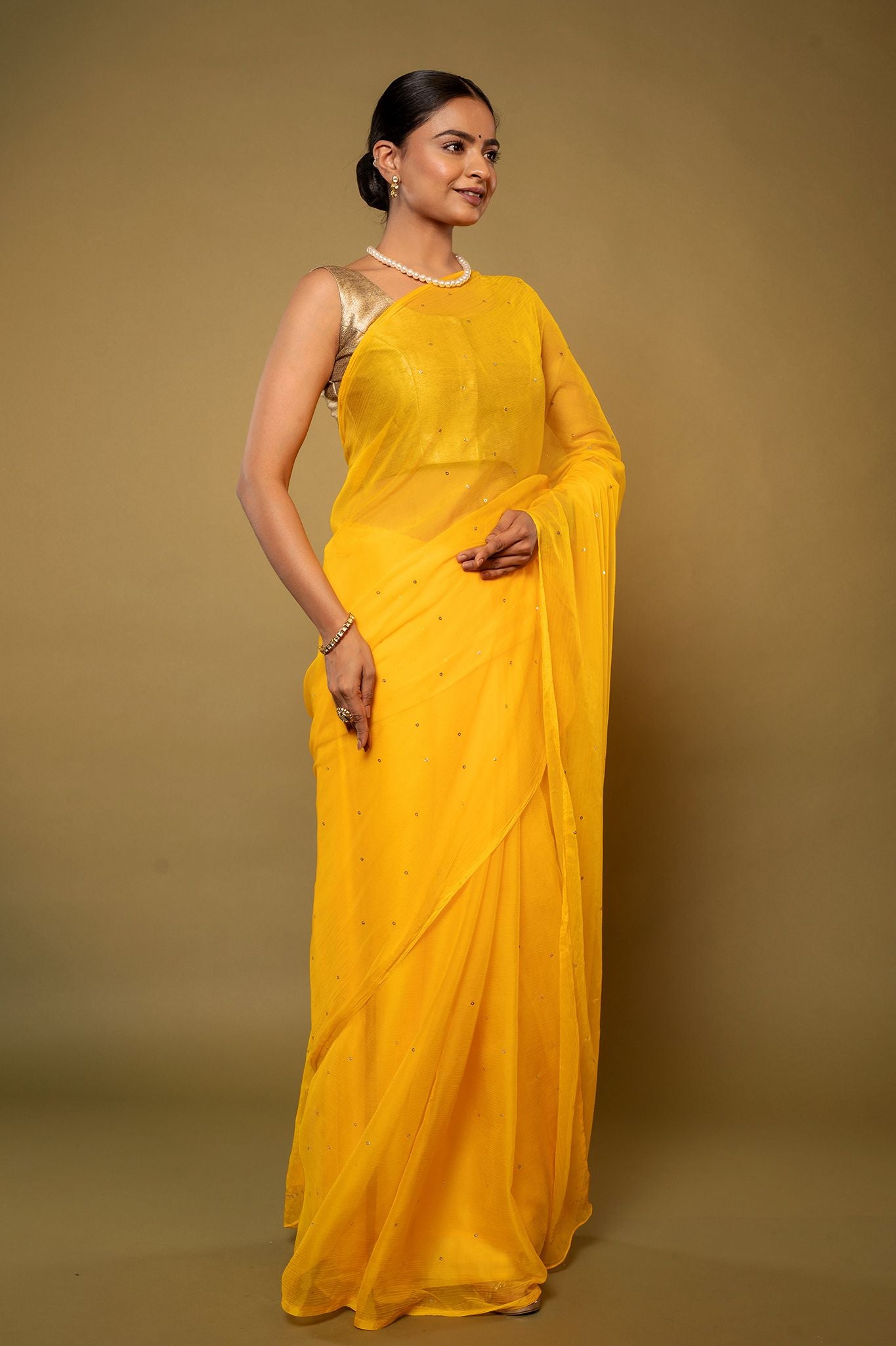Yellow viscose chiffon Ringmukesh  handwork casual wear saree