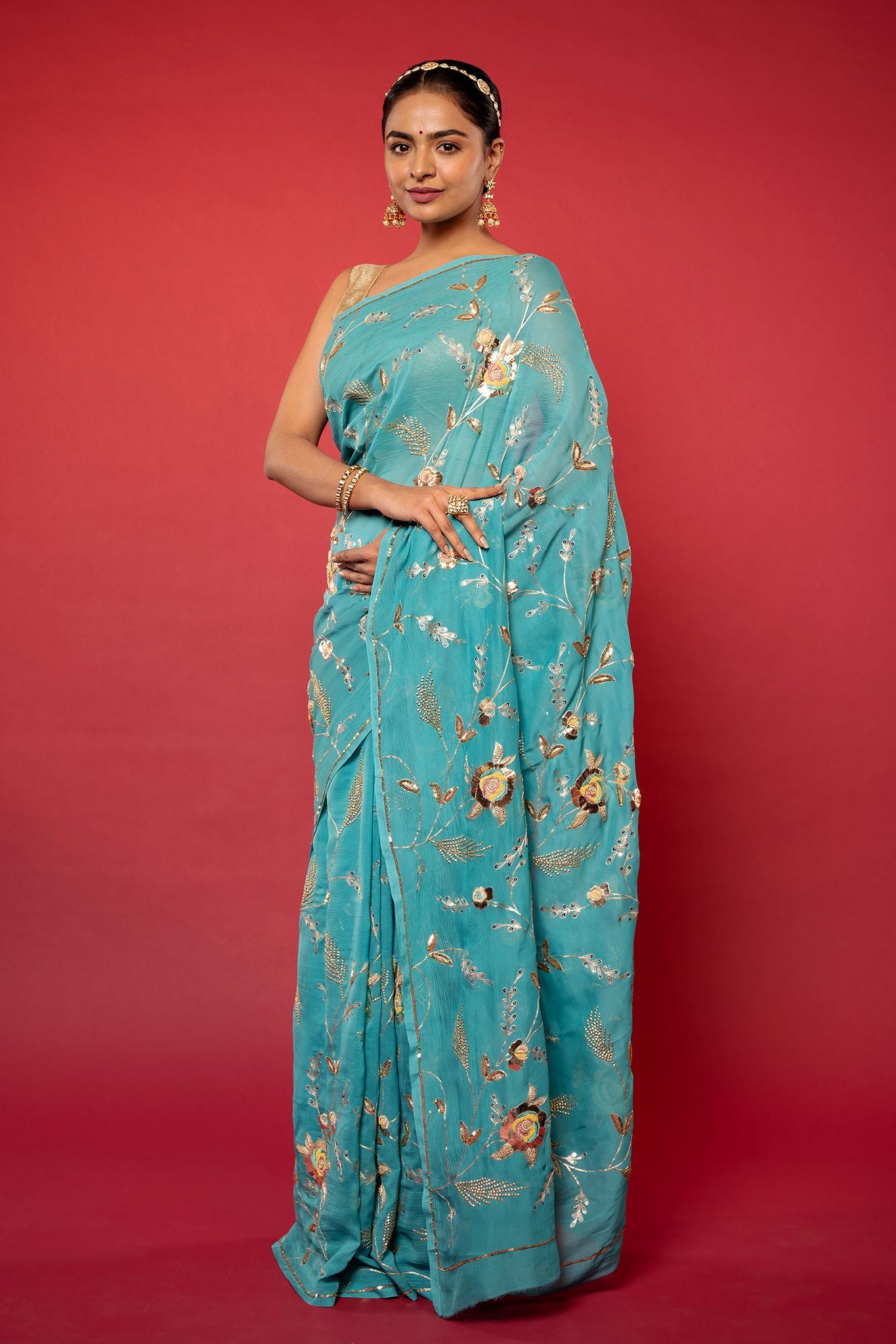 Turquoise  pure chiffon aari sequins  jaal handwork saree