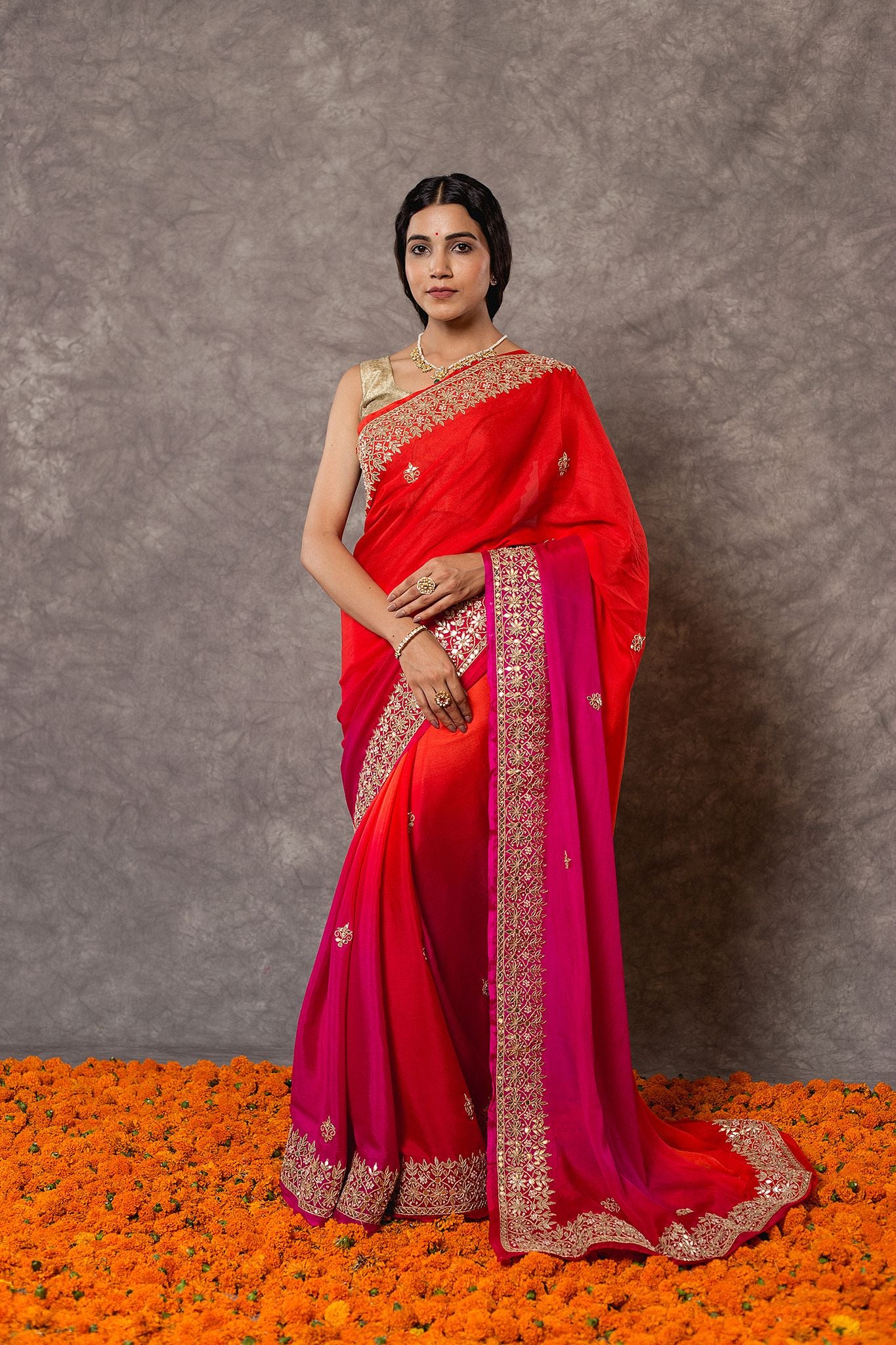 Rani orange pure chinnon chiffon gota pati border butti handwork saree