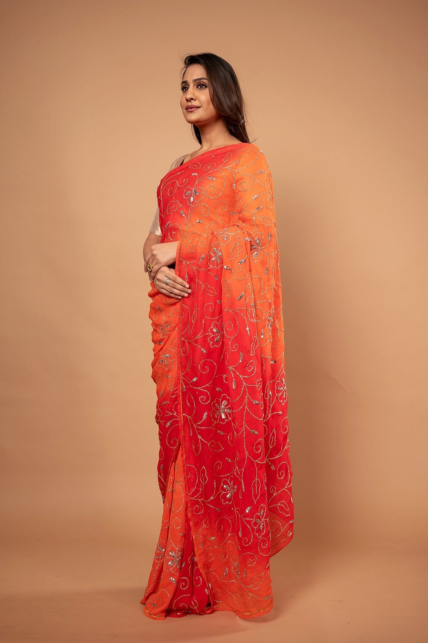 Orange light dark pure chiffon sequins jaal handwork saree