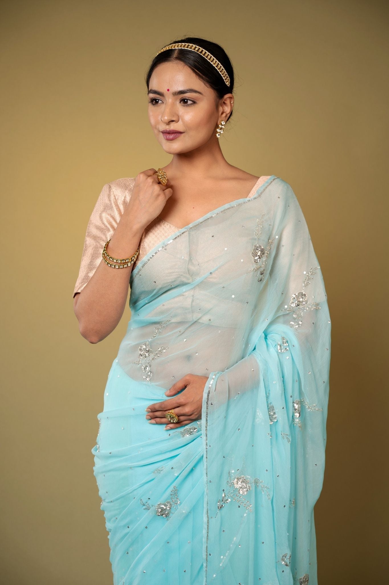 Sky blue  viscose chiffon sequins  motif  handwork casual wear saree