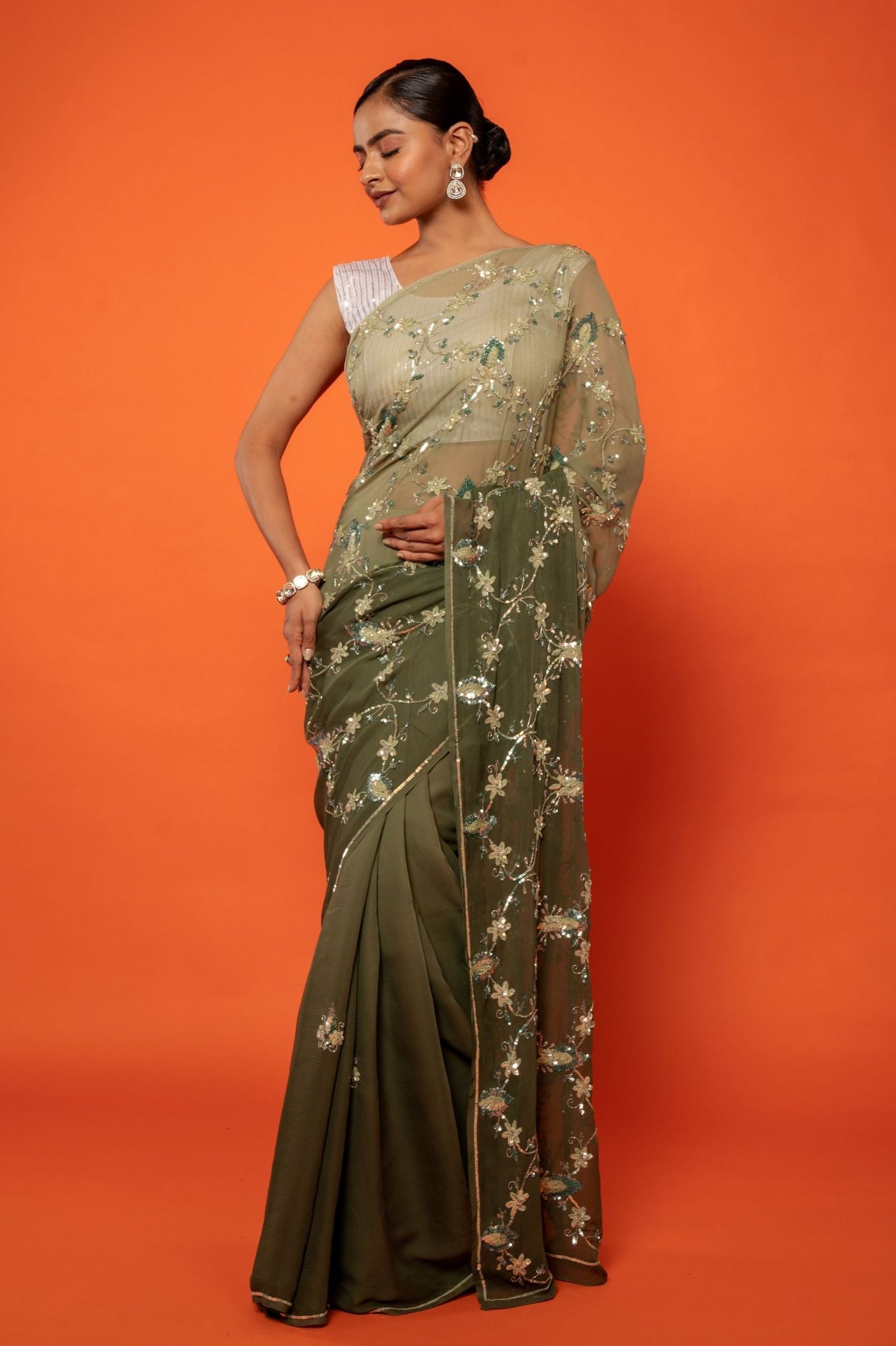 Olive green pure chiffon  aari sequins  jaal handwork saree
