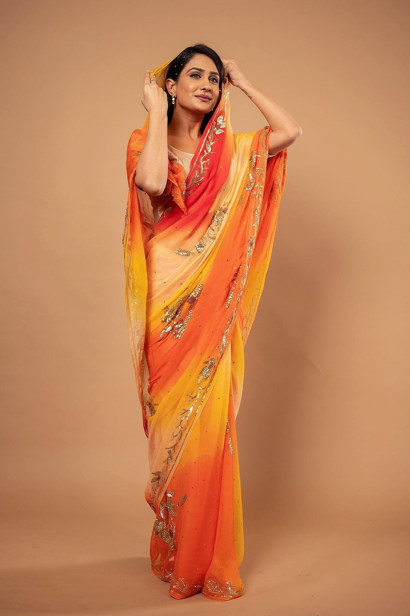 Yellow orange Pure Chiffon Aari sequins  Motif handwork saree