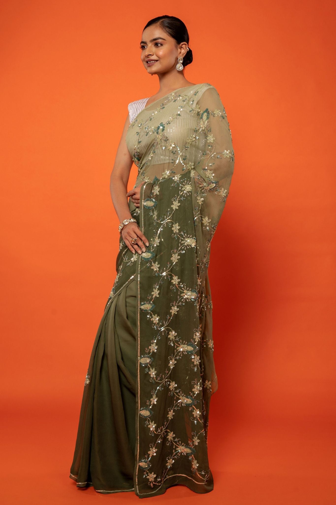 Olive green pure chiffon  aari sequins  jaal handwork saree