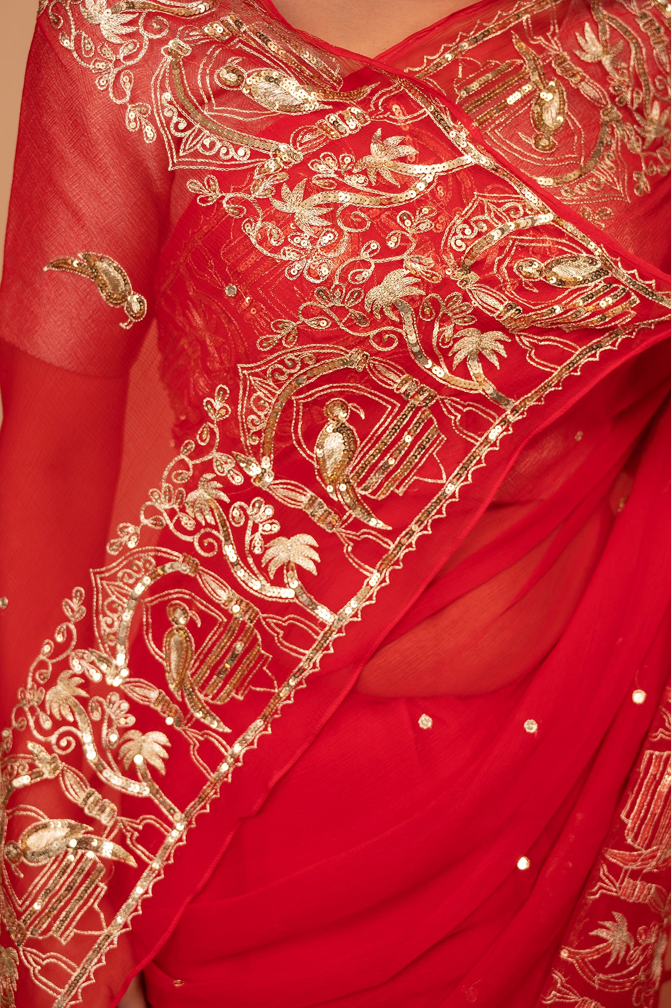 Red viscose chiffon aari sequins border butti handwork casual wear saree