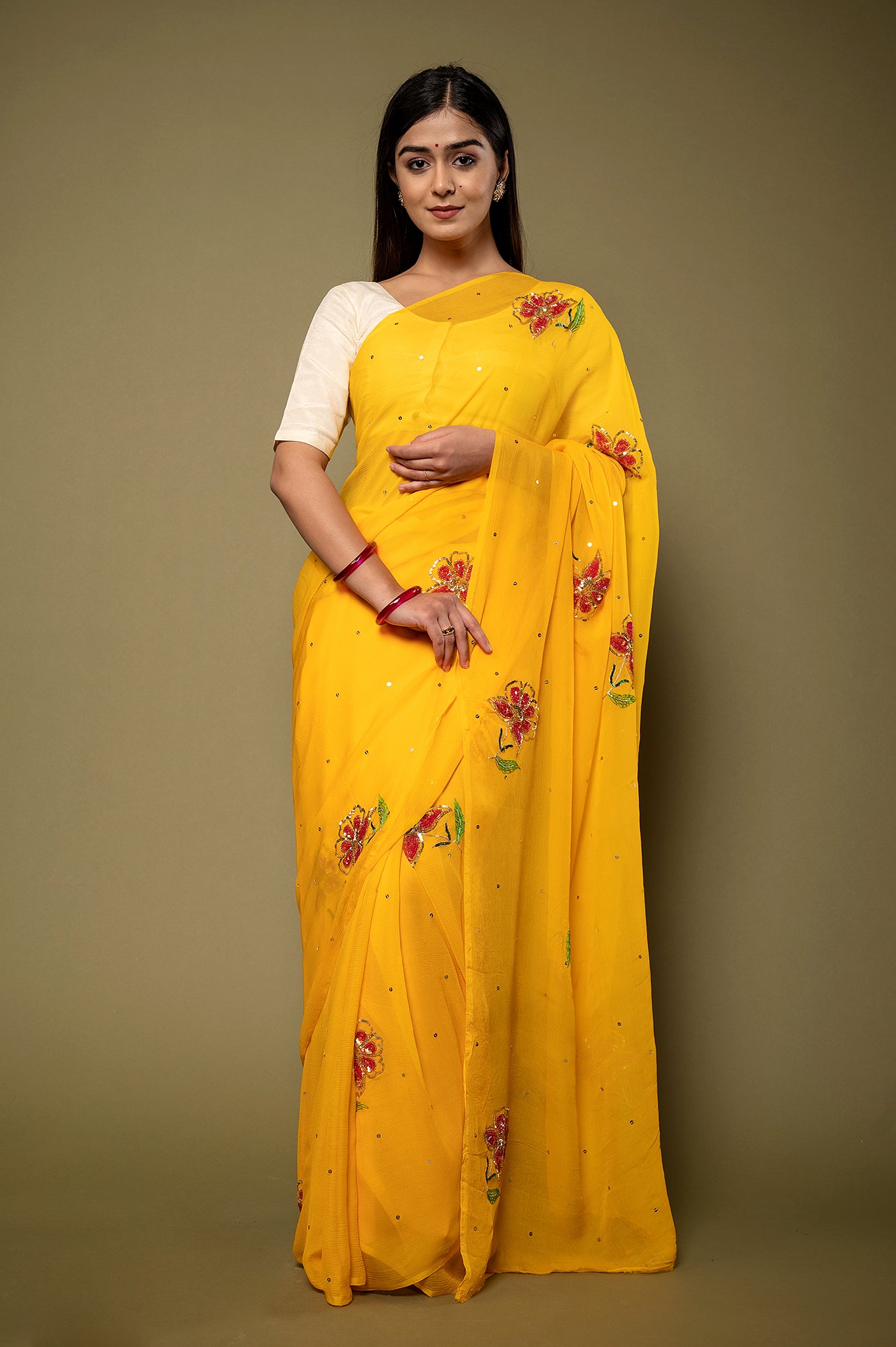 Yellow viscose chiffon sequins resham motif handwork party wear saree