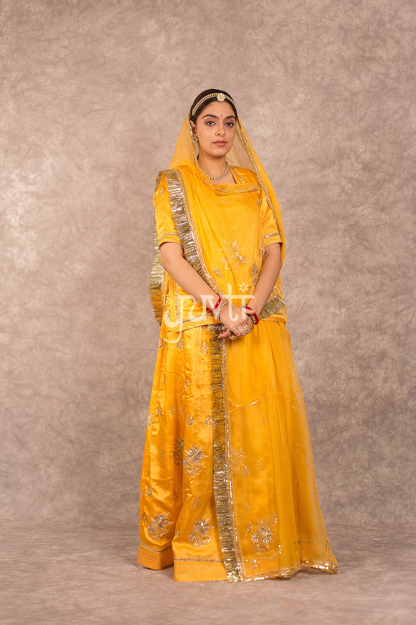 Yellow Bamber Satin Aari Sequins Boota work Rajputi Poshak