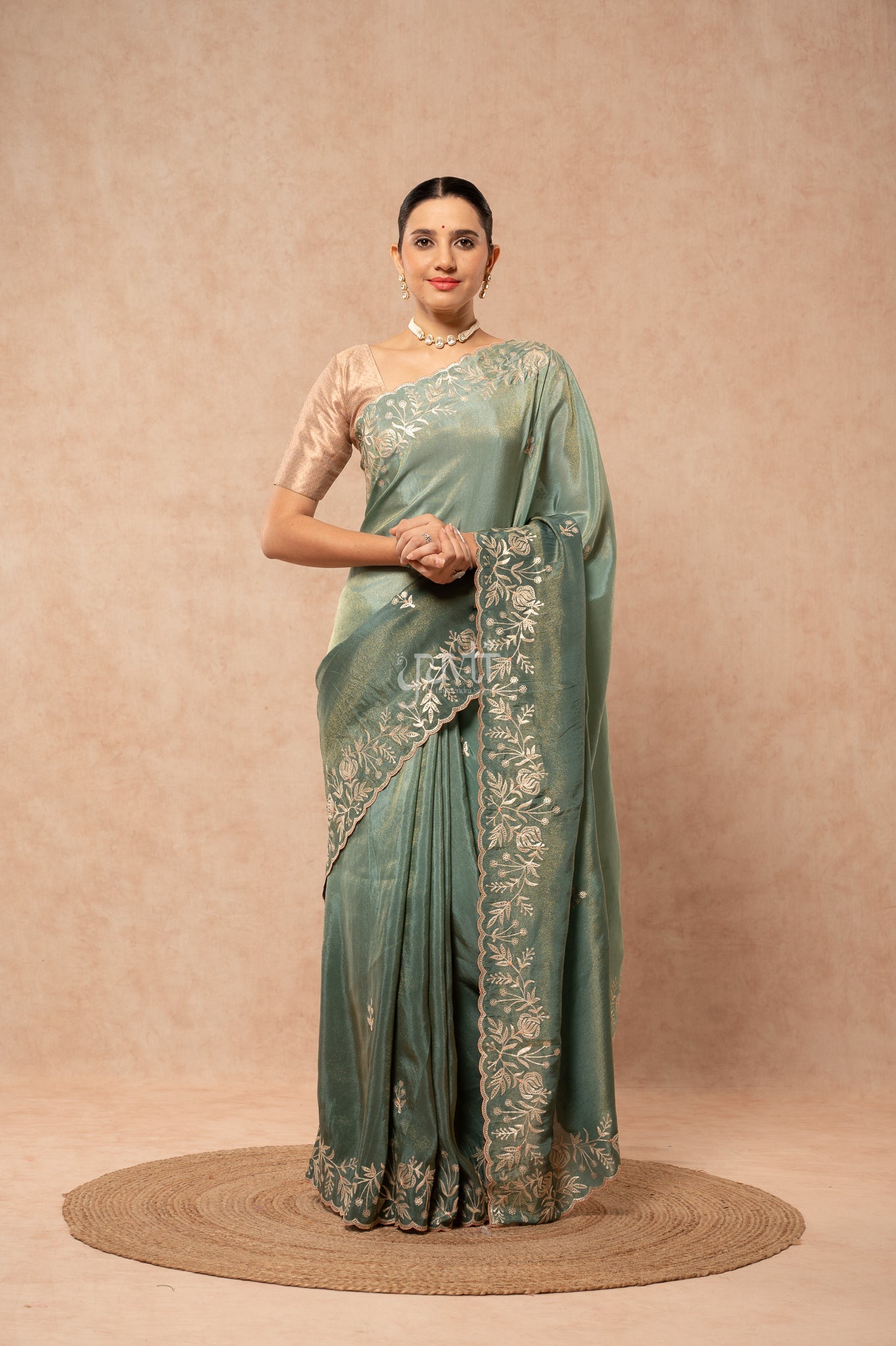 Mate Green Shaded Viscose Tissue Aari Border Motifs (Butti)   Saree