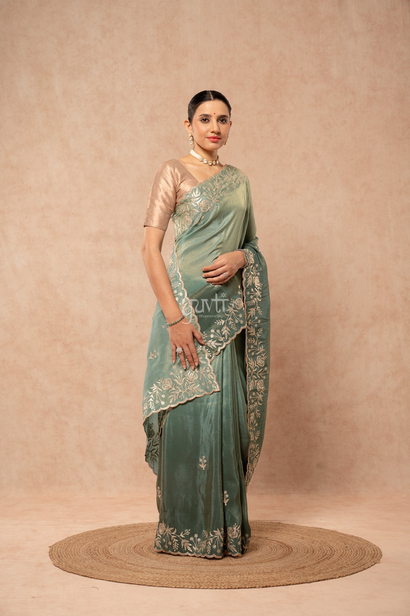 Mate Green Shaded Viscose Tissue Aari Border Motifs (Butti)   Saree
