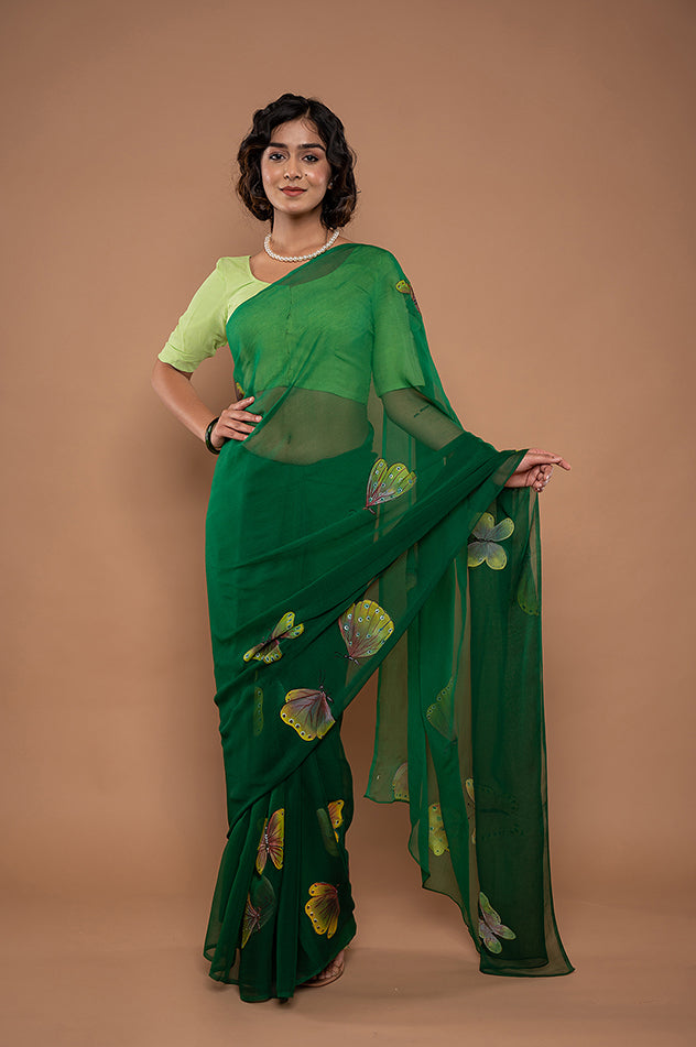 bottle green viscose chiffon hand painted handwork saree