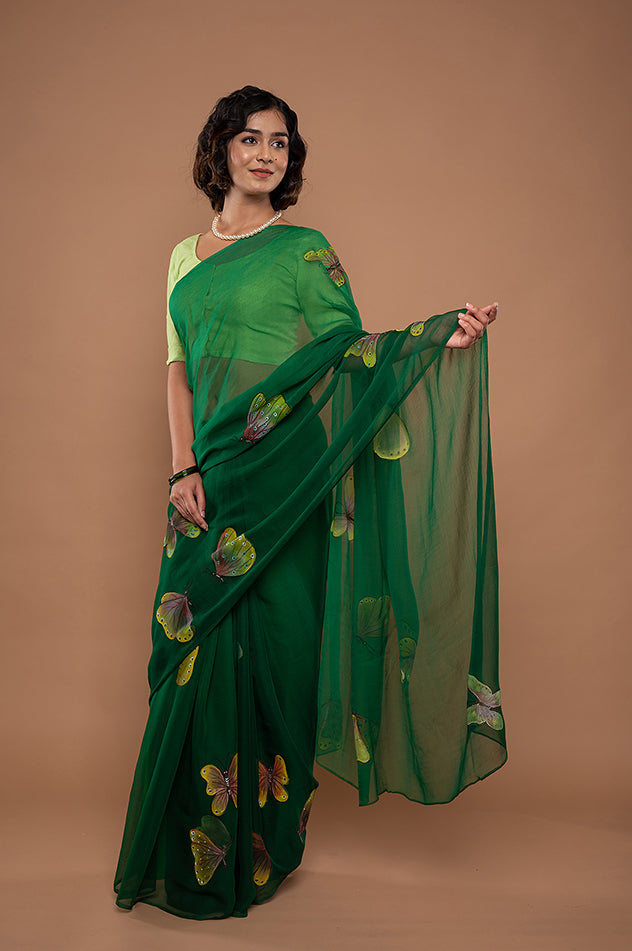 bottle green viscose chiffon hand painted handwork saree