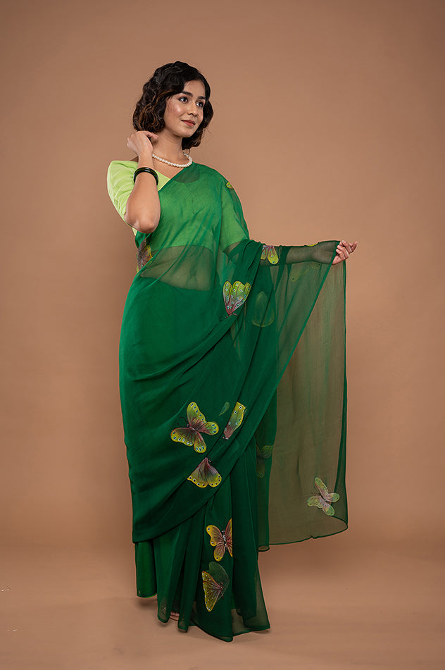 bottle green viscose chiffon hand painted handwork saree