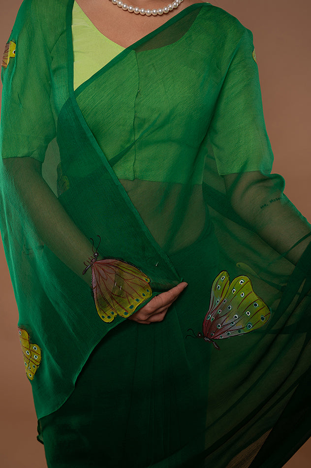 bottle green viscose chiffon hand painted handwork saree