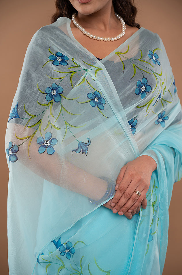 sky blue viscose chiffon hand painted handwork saree