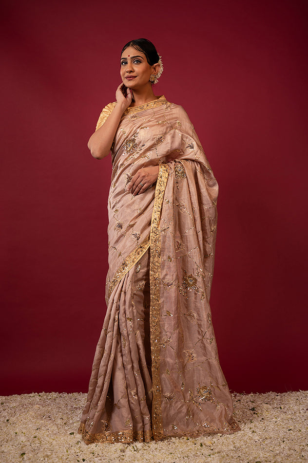 Soft peach pure tissue aari sequins jaal handwork saree