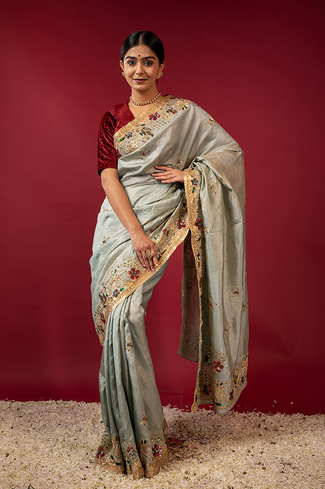 Greyish green pure tissue zardozi sequins border butti handwork saree