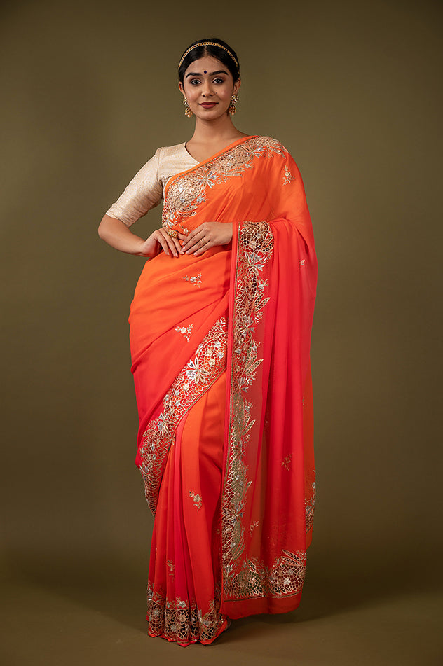 Orange light dark pure chiffon cut work border butti handwork saree