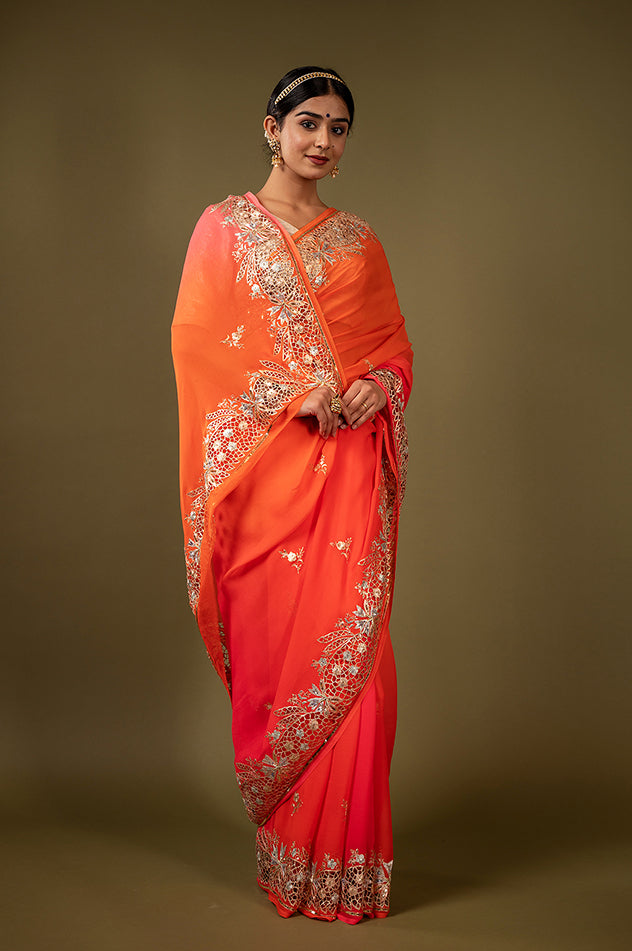 Orange light dark pure chiffon cut work border butti handwork saree